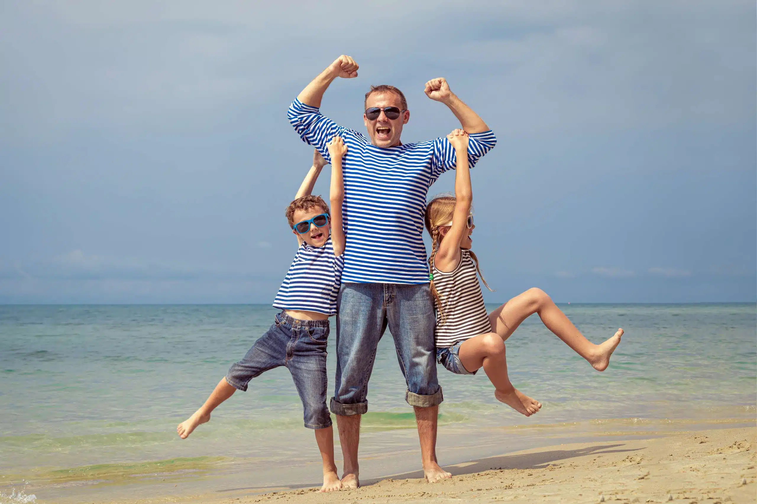 Fatherchildrenplaying copy scaled 1.jpg
